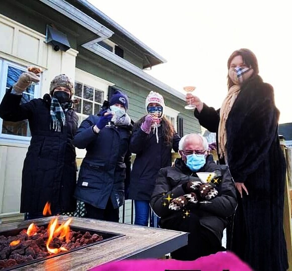 The Bernie Sanders meme photoshopped into a group picture, all with masks on.